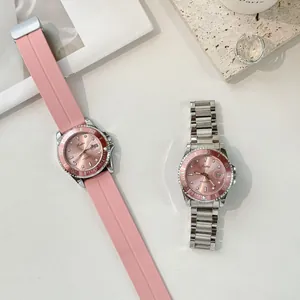 Detailed view of Scottie pink dial quartz watches with rubber strap and silver bracelet