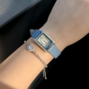 Elegant Scottie vintage rectangular quartz watch with blue leather strap and diamond-set bezel