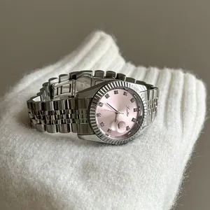 Elegant silver women's watch featuring a pink dial and stone markers on white knit background
