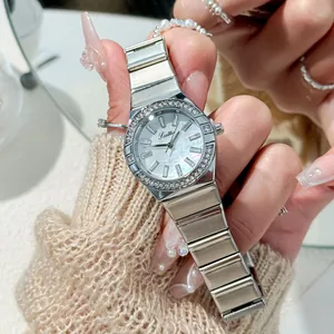 Close-up detail of Scottie silver quartz watch with rhinestone bezel and pearl dial