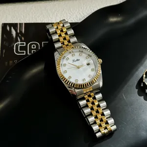 Elegant Scottie 9570 gold and silver ladies quartz watch with crystal dial detail.