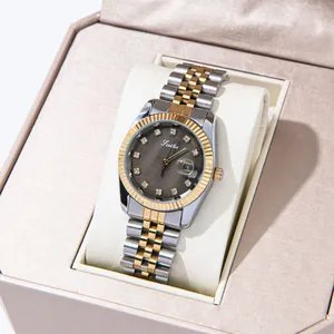 Luxury women's quartz watch in two-tone silver and gold, displayed in a gift box