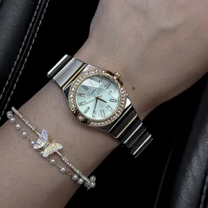 Detailed macro view of Scottie women's luxury watch with emerald dial and crystal bezel