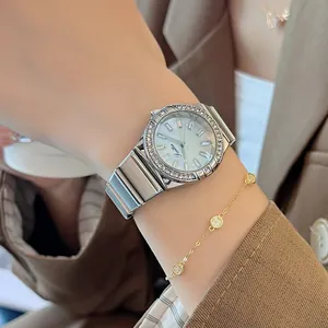 Scottie 9698 luxury women's quartz watch with diamond-set bezel and silver steel strap
