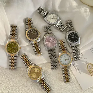 Detailed view of luxury Scottie quartz watches in various dial colors and metal finishes