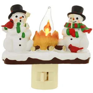 Decorative Snowman and Campfire Night Light with festive red and green scarves details