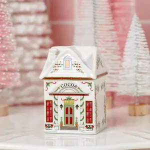 Ceramic Christmas village spice house cocoa jar with a festive holiday cottage design