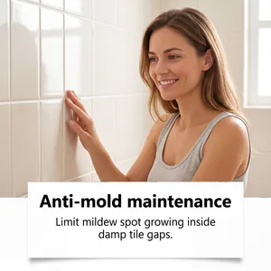 Una mujer tocando azulejos blancos de baño con efecto de mantenimiento antimoho