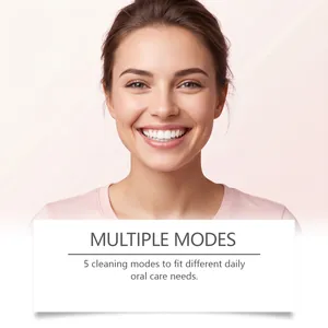 Détail des modes de brosse à dents électrique avec le sourire éclatant du modèle.