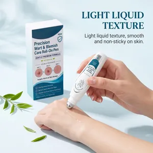 Close-up view of precision wart care roll-on pen showing light liquid texture on hand skin.