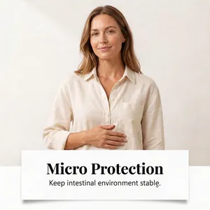 Detail view of a woman holding her stomach, emphasizing intestinal care drops benefits.