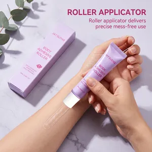Macro view of JAYSUING purple body adhesive roller being applied precisely to the skin