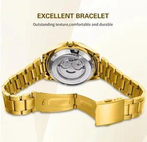 Close-up of gold steel watch strap and transparent case back showing automatic movement