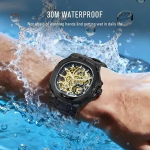 Macro shot of a black skeleton mechanical watch showing 30m water resistance with splashes.