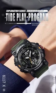 Close-up of SMAEL multi-functional sports watch with green canvas strap on wrist