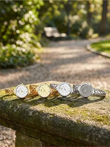 GEDI elegant women's quartz watches with chain bracelets shown in gold and silver colors