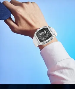 Close-up of white SMAEL digital sports watch worn on wrist with blue background
