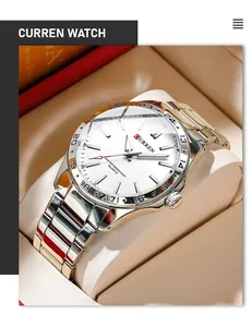 Close-up detail of CURREN men's business stainless steel quartz watch in a display box