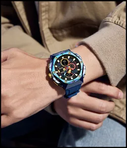 Close-up view of SMAEL blue iridescent sports watch worn on a man's wrist in style.