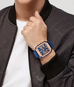 Close-up detail of SMAEL men's square sports watch with blue strap and rose gold bezel