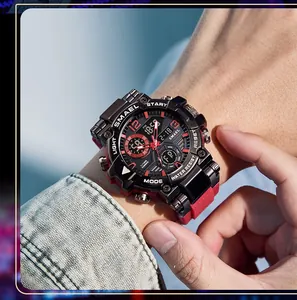 Close-up of SMAEL men's sports watch with dual time display and red strap