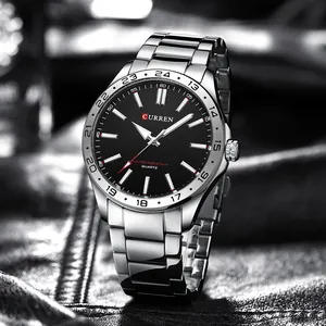 Detailed shot of the CURREN 8452 watch bezel and dial texture on a leather background
