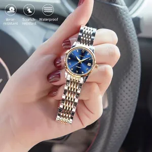 Elegant ladies automatic watch with blue sunray dial and two-tone stainless steel strap.