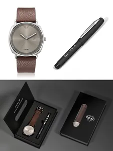 Detailansicht der TOMI minimalistischen silbernen Quarzuhr und des schwarzen Stifts im Geschenkset