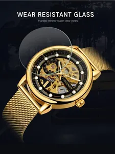 Gold T-Winner skeleton mechanical watch with scratch-resistant Hardlex glass mirror.