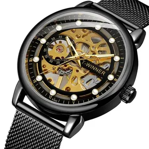 Close-up of T-winner men's skeleton mechanical watch with gold gears and black mesh strap