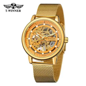 Detail of T-WINNER men's manual mechanical watch with golden skeleton dial and mesh strap