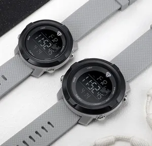 Close-up of TOMI waterproof digital sports watch with a grey silicone strap.