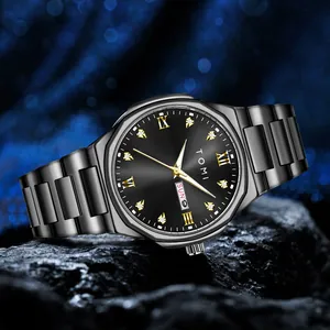 Detail of Tomi men's business quartz watch with diamond-set dial on rock background