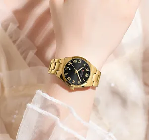 Detailed view of the CURREN women's quartz watch featuring a gold metal strap.