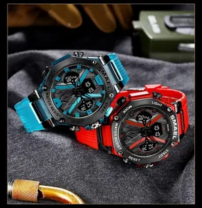Detail of SMAEL dual display sports watch with luminous dial and waterproof alloy case.