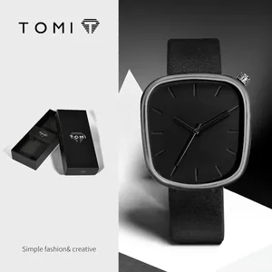 Μινιμαλιστικό μαύρο ρολόι quartz σε σχήμα βότσαλου με δερμάτινο λουράκι και κουτί