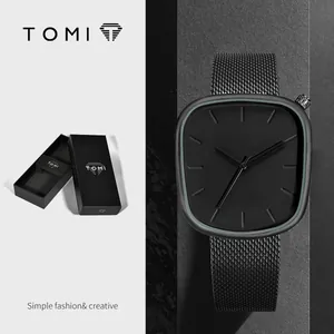 Κομψό μινιμαλιστικό ρολόι χαλαζία TOMI σε σχήμα βότσαλου με μαύρο λουράκι mesh