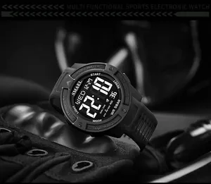 Close-up of SMAEL men's digital sports watch with LED display and tactical finish