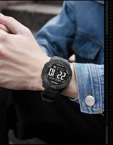 Detailed close-up showing SMAEL men's waterproof digital sports watch on a wrist