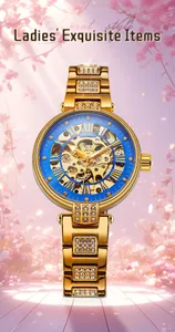 Elegante goldene Damen-Skelettuhr von FORSINING mit blauem Zifferblatt und Strasssteinen