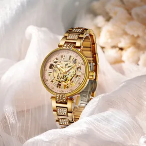 FORSINING Luxus Damen Gold Skelett Automatik Mechanikuhr mit glänzenden Strasssteinen