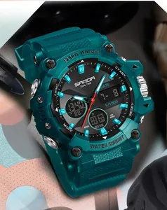 Dettaglio macro dell'orologio sportivo SAMDA verde acqua con doppio display e design robusto.