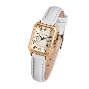 Montre rectangulaire vintage pour femme avec boîtier or rose et bracelet en cuir blanc