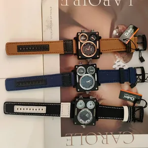 Close-up of men's square multi-dial quartz watches with durable canvas straps.