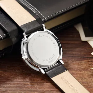 Close-up of PAIDU men's watch stainless steel case back and genuine leather strap