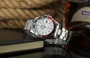 Macro shot of WINNER automatic mechanical watch with silver steel strap and white dial