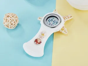 Detailed view of a white silicone digital nurse watch with a cartoon nurse character