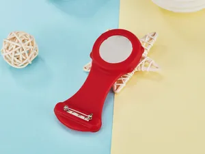 High quality red silicone nurse watch fob cover with safety pin attachment detail view