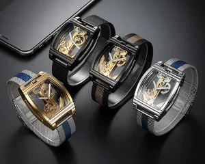 Close-up of four luxury men's automatic mechanical skeleton watches with metal mesh straps