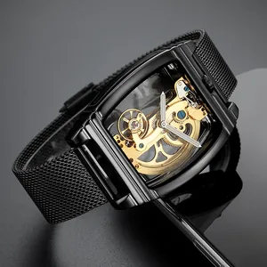 Close-up of luxury black skeleton automatic mechanical watch with gold movement gears